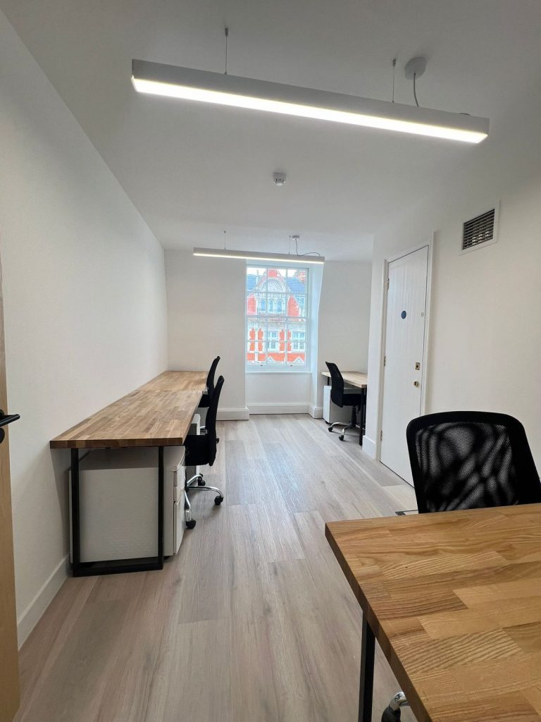 5-desk Mayfair office to rent on the fourth floor of 27 Hill Street, 160 sq ft with natural light