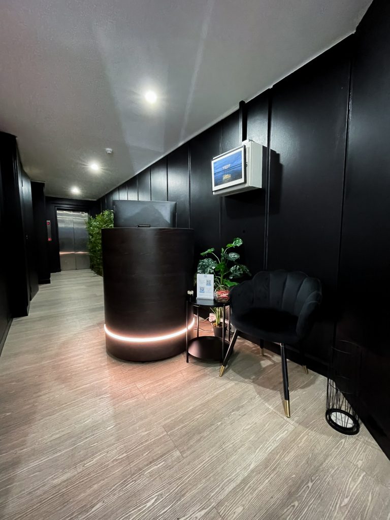 Reception area with sleek design and seating at 189 Brompton Road, Knightsbridge