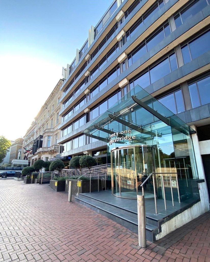 Modern office building exterior at 21 Knightsbridge, Hyde Park, featuring glass panels and a clean architectural design.