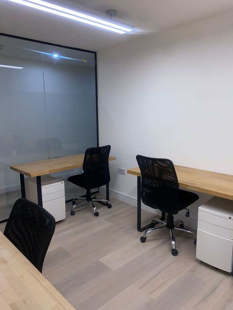 Modern office in South Kensington located at 189 Brompton Road, featuring a bright workspace with stylish furnishings.