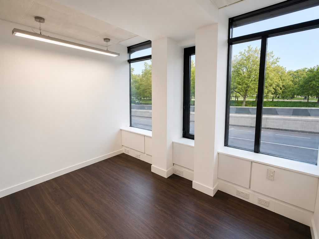 Healthcare consulting room at 21 Knightsbridge with natural light and park views