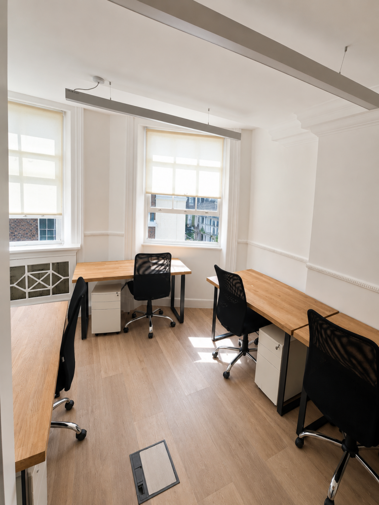 Office Space in Mayfair at 27 Hill Street with multiple workstations and natural light