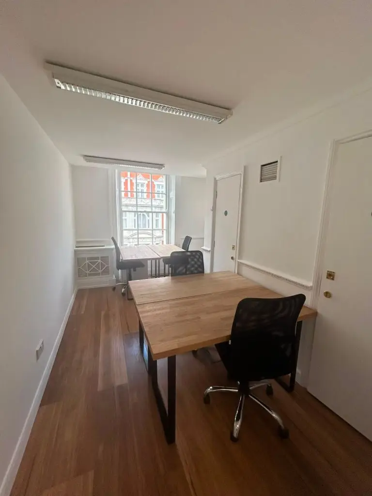 Office for Small Teams in Mayfair with four-desk workspace and modern furnishings